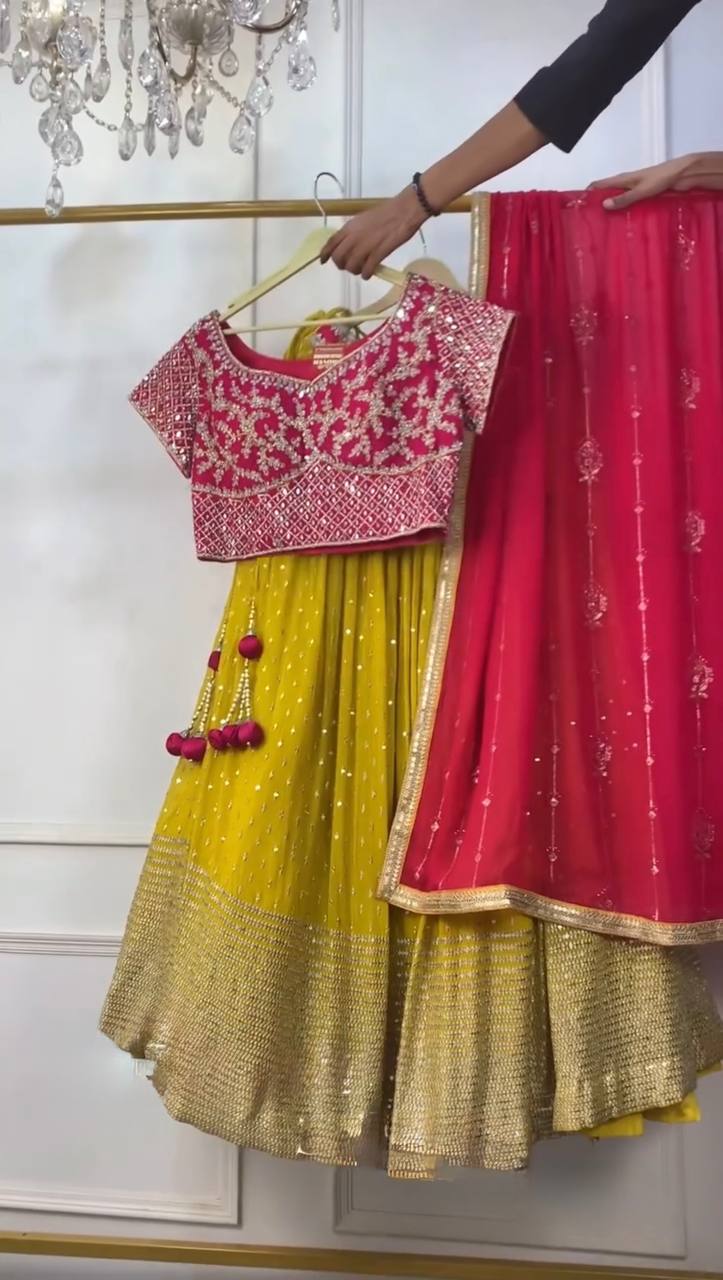 Vibrant Sunshine Yellow and Fuchsia Pink Designer Lehenga Choli with Dazzling Shimmer Embellishments
